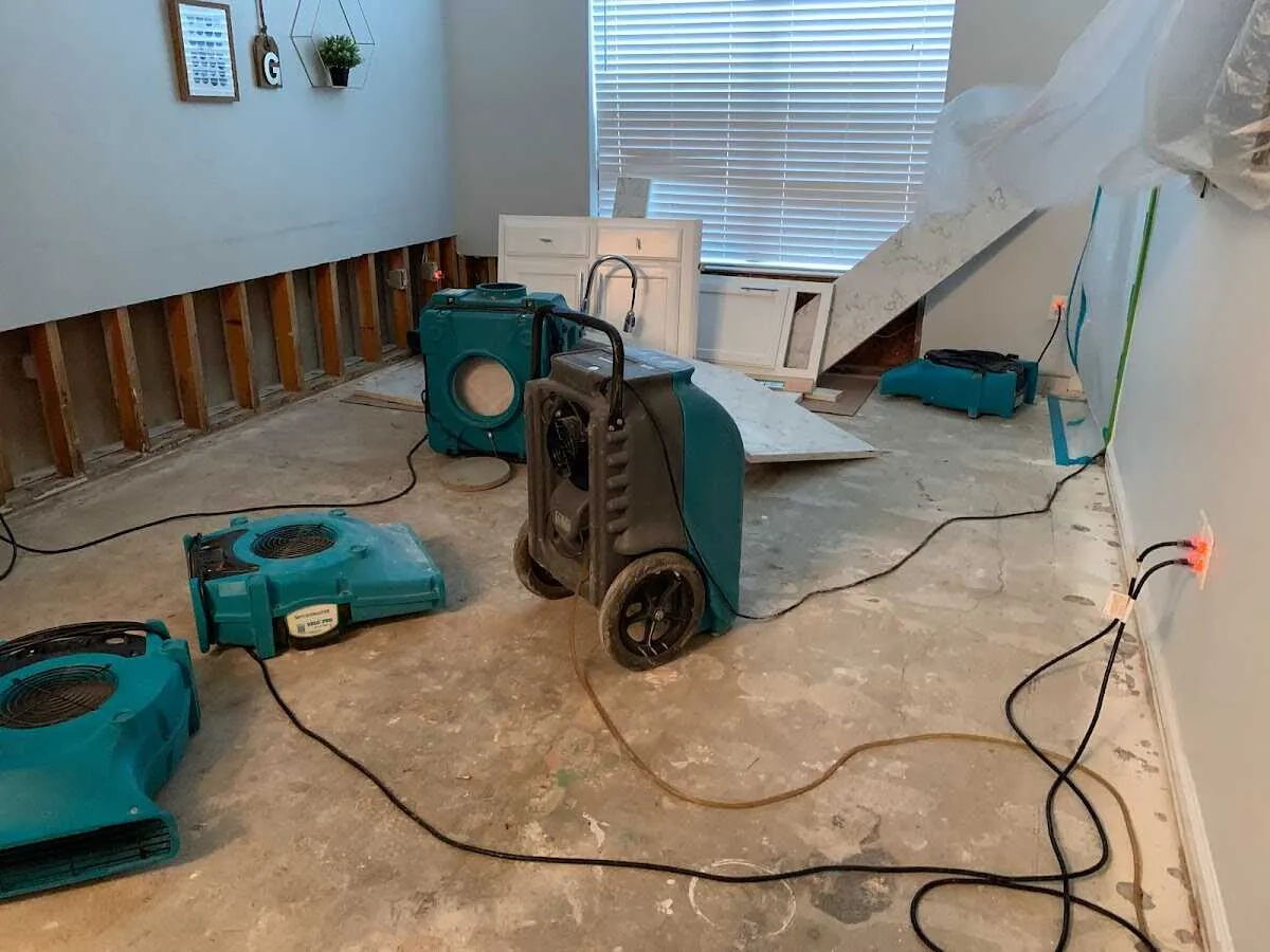 Dehumidifier in flood-cut room for Water Damage Restoration in New Prague